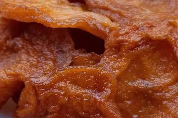 膨化苹果脯怎么加工,需经历选料、硬化、糖煮、膨化等步骤